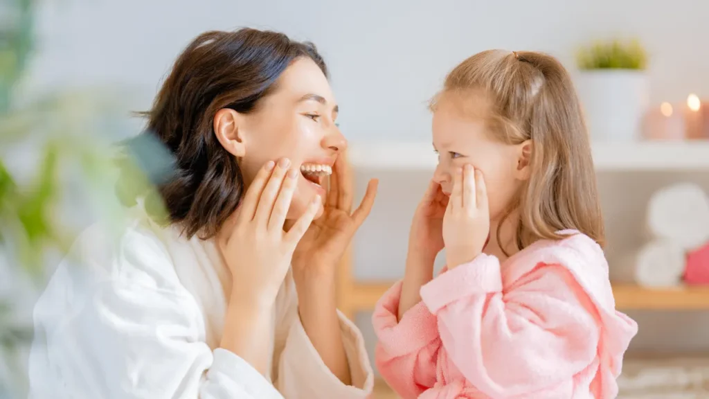 Mother and daughter with glowing skin